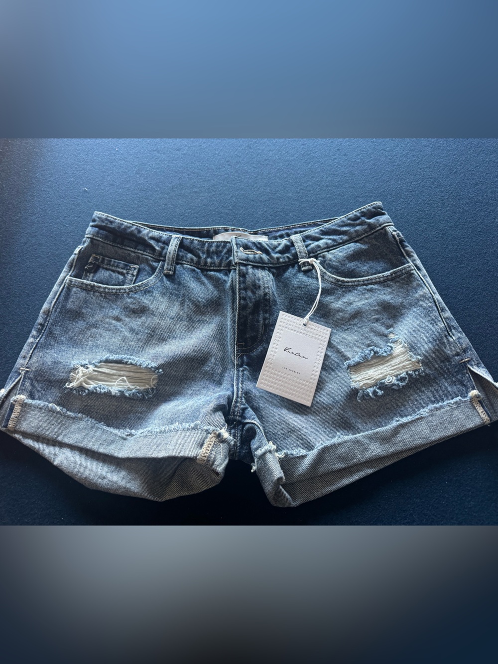 KanCan Blue Denim Shorts with Raw Hem, small side slit and Belt Loop Detail💙